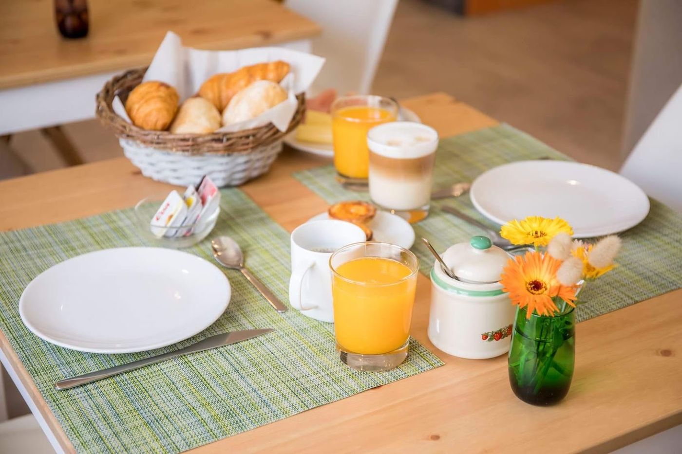 Breakfast with croissants and juice